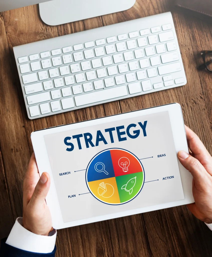 Digital marketing strategy planning on tablet showing business growth chart and data analysis