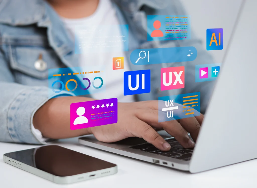 UI UX design interface on laptop showing user experience elements, icons and digital product design workflow